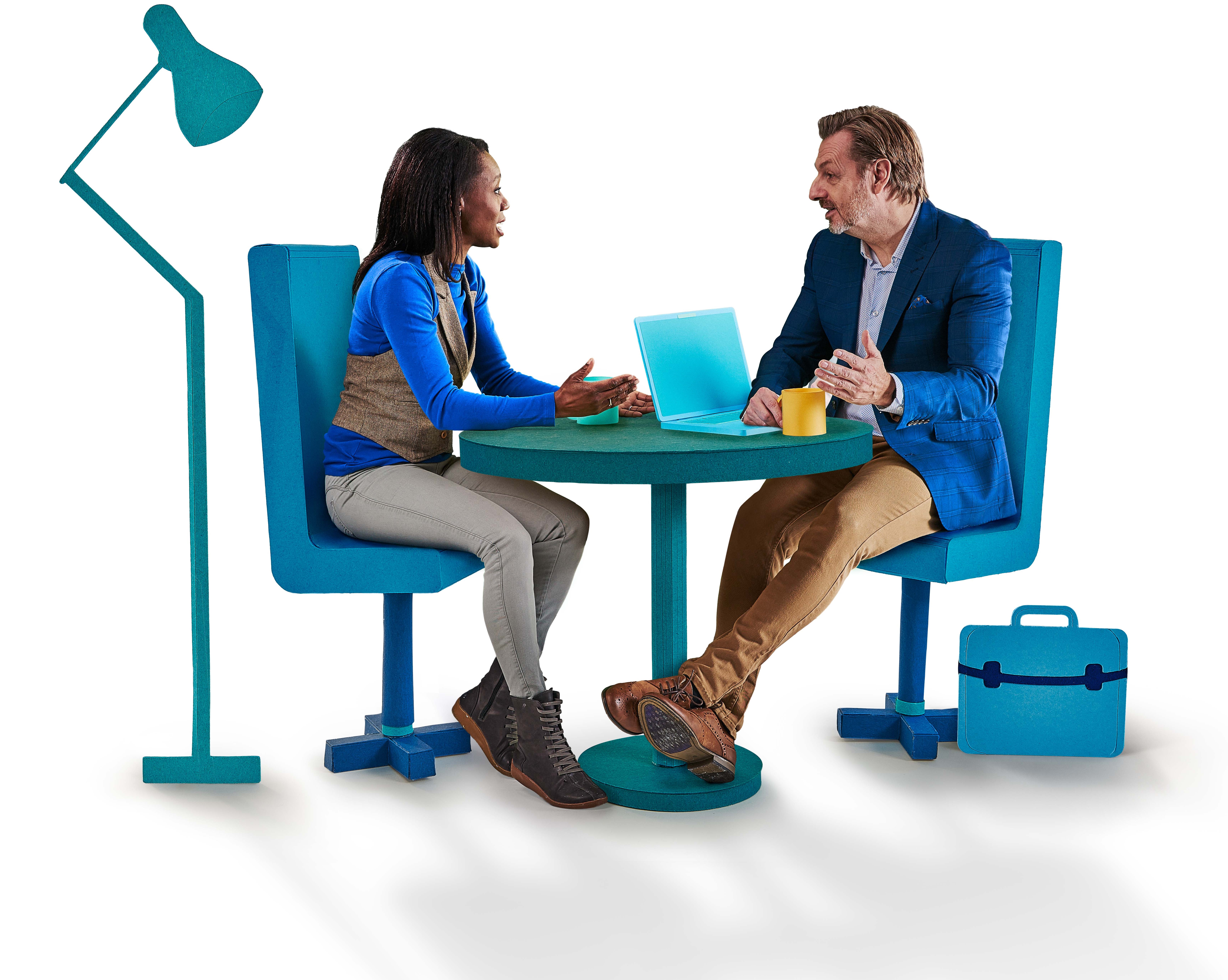 Man and woman talking at table